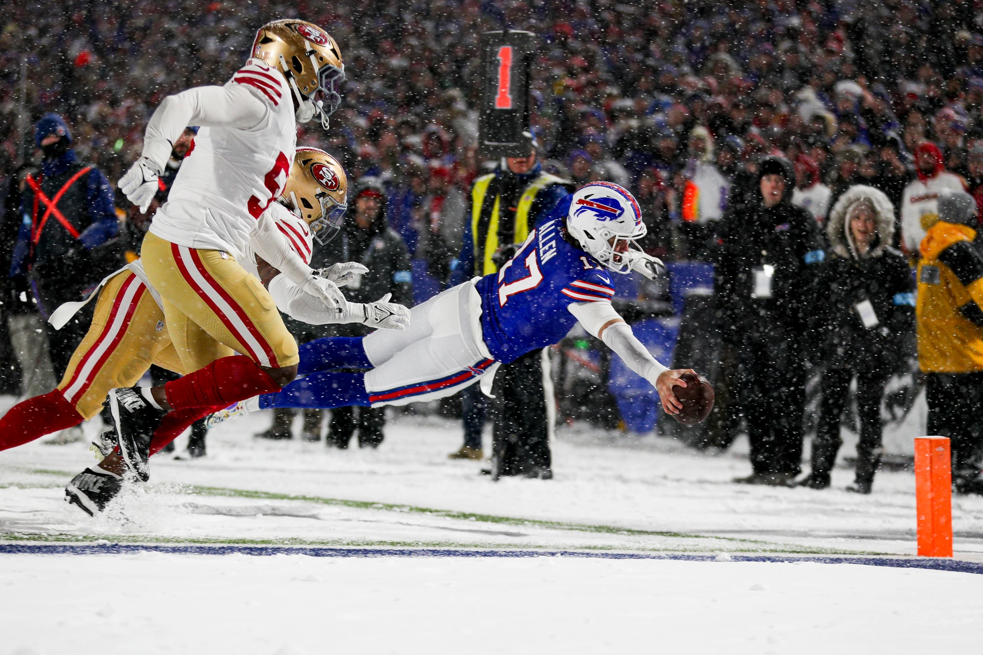 Josh Allen #17 of the Buffalo Bills dives for a touchdown in the third quarter of a game against the San Francisco 49ers at Highmark Stadium on December 01, 2024 in Orchard Park, New York. The Bills are in the top 5 best Super Bowl odds for 2025.