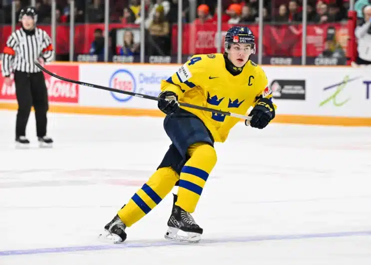 Axel Sandin-Pellikka #4 of Team Sweden skates in the second period against Team Kazakhstan of the Group B match during the 2025 IIHF World Junior Championship at The Arena at TD place on December 27, 2024 in Ottawa, Ontario, Canada. Team Sweden defeated Team Kazakhstan 8-1. 