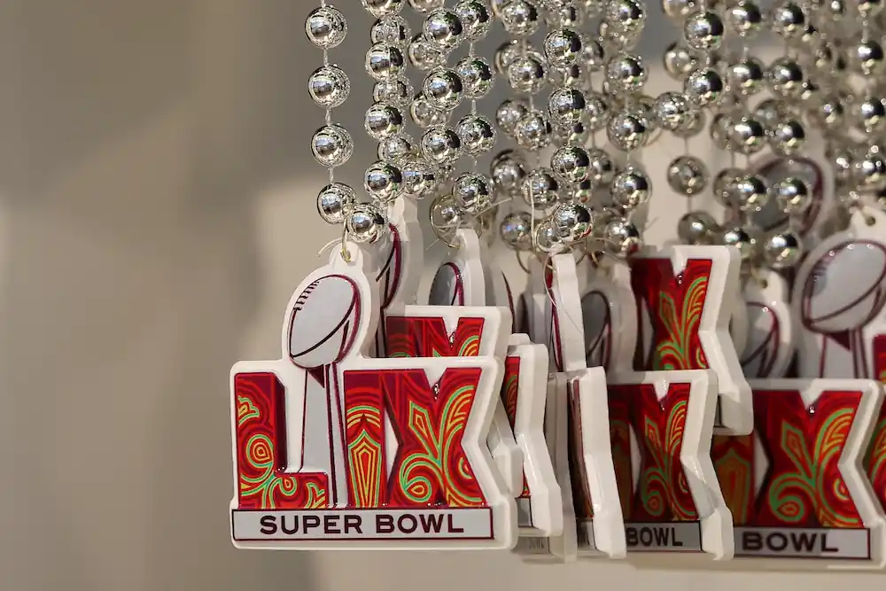 The Super Bowl LIX logo on a beaded necklace for sale inside Louis Armstrong New Orleans International Airport on December 02, 2024 in Kenner, Louisiana.