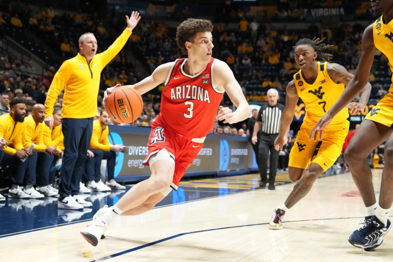 Anthony Dell'Orso #3 of the Arizona Wildcats drives to the basket in the fist half during a college basketball game against the West Virginia Mountaineers at the WVU Coliseum on January 7, 2025 in Morgantown, West Virginia.