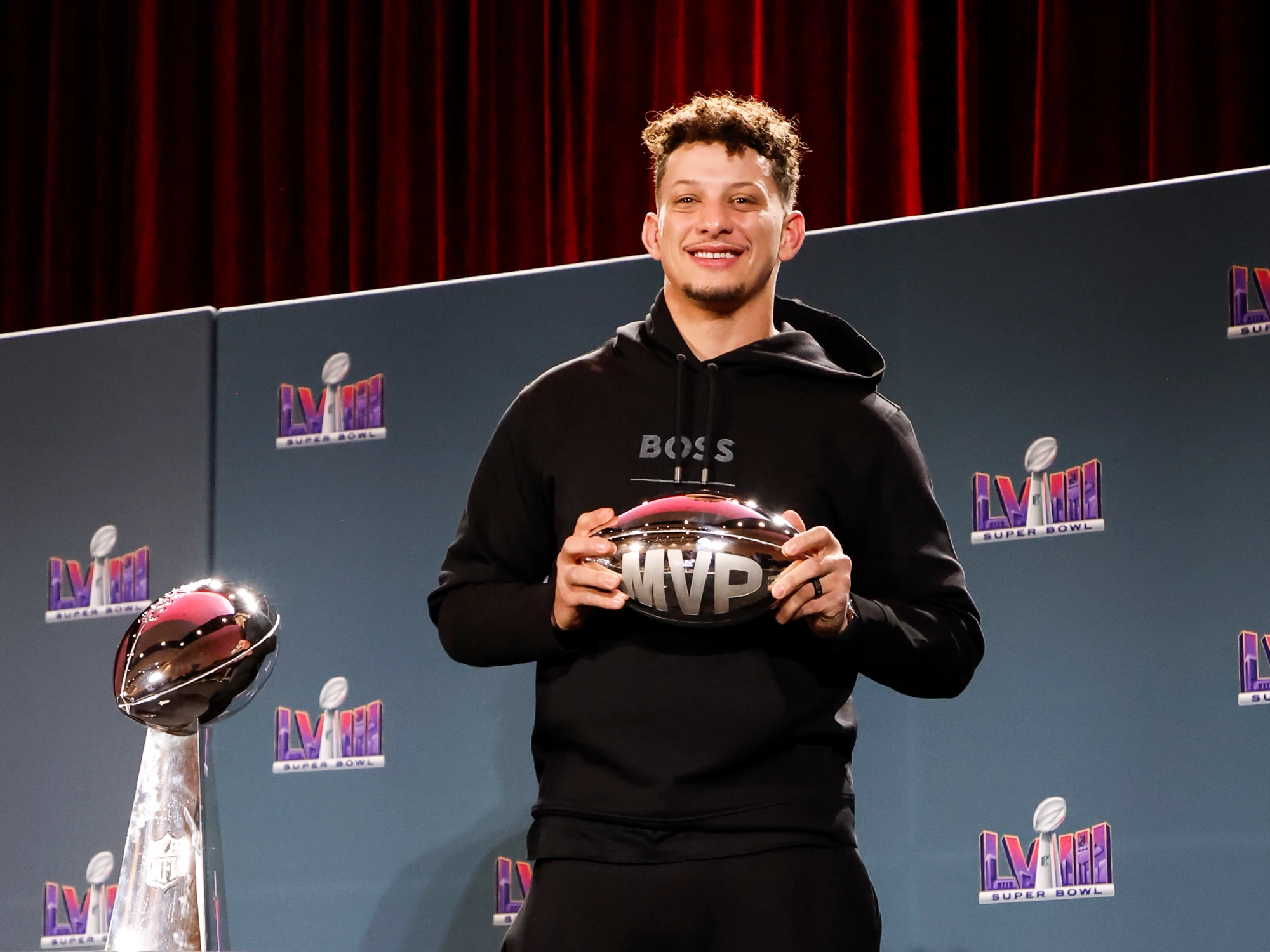 Quarterback Patrick Mahomes of the Kansas City Chiefs poses after being presented the Pete Rozelle Trophy as Super Bowl LVIII Most Valuable Players during the Super Bowl Winning Team Head Coach and MVP Press Conference at the Mandalay Bay North Convention Center on February 12, 2024 in Las Vegas, Nevada.