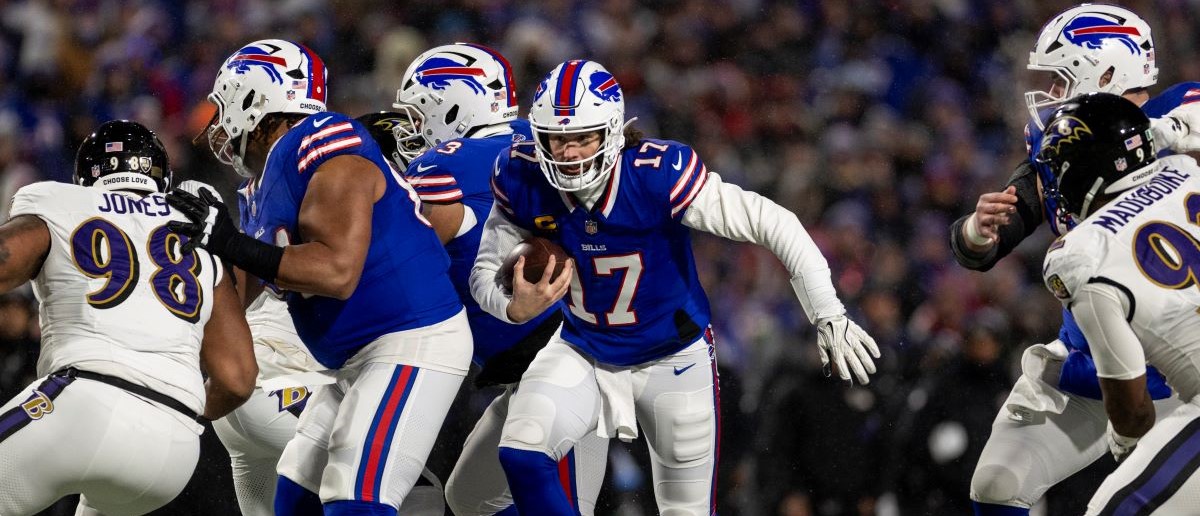 Josh Allen #17 of the Buffalo Bills runs with the ball during an NFL Football game against the Baltimore Ravens at Highmark Stadium on January 19, 2025 in Orchard Park, New York