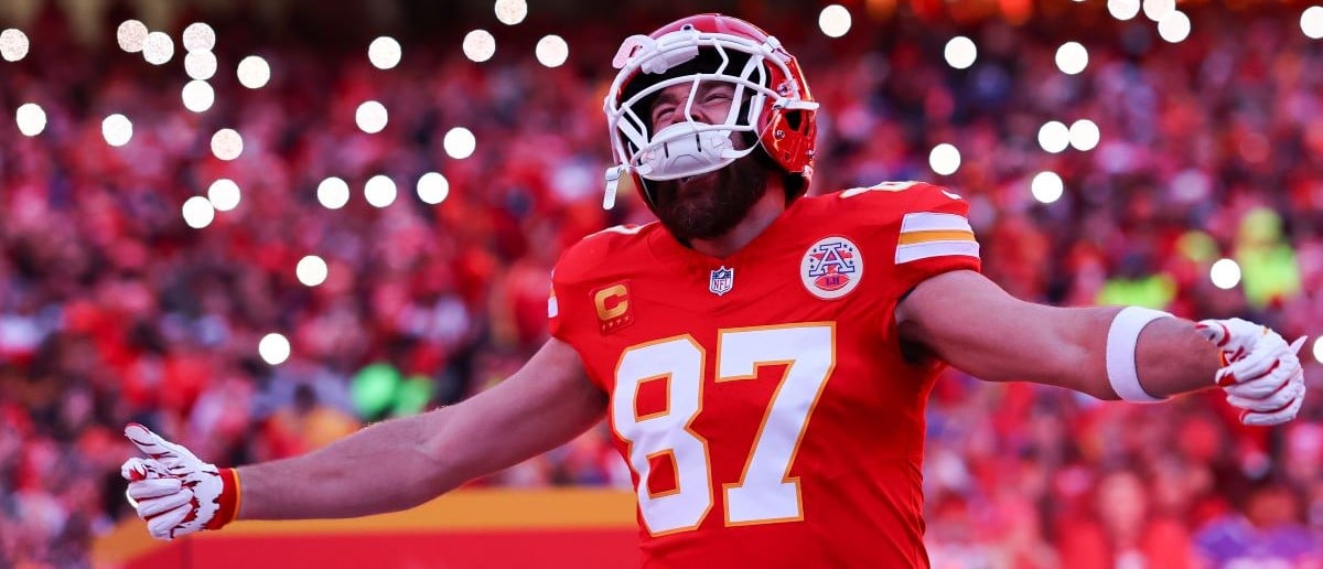 Travis Kelce #87 of the Kansas City Chiefs runs onto the field during player introductions prior to the AFC Championship Game against the Buffalo Bills at GEHA Field at Arrowhead Stadium on January 26, 2025 in Kansas City, Missouri.