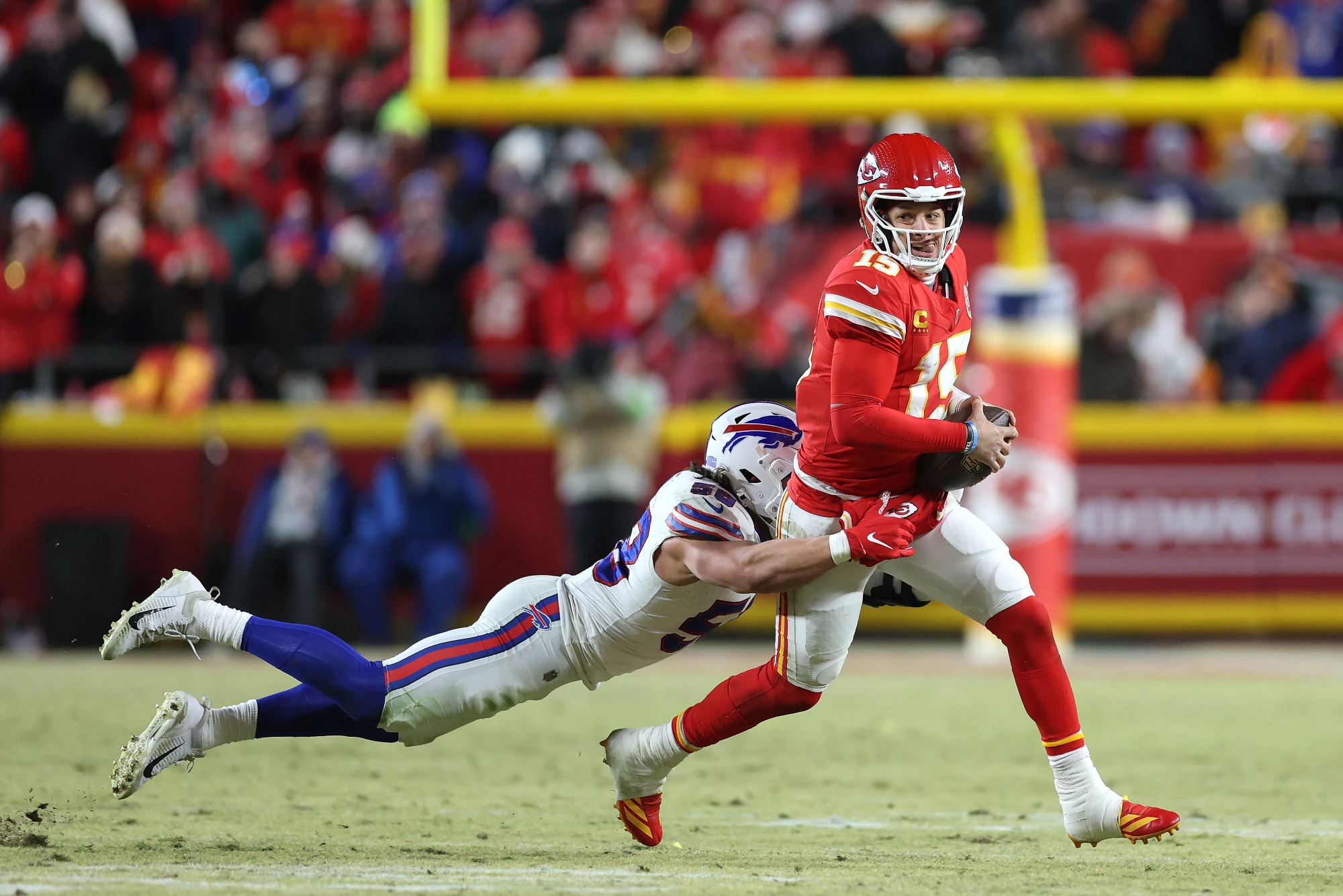 Patrick Mahomes #15 of the Kansas City Chiefs is sacked by Matt Milano #58 of the Buffalo Bills during the third quarter in the AFC Championship Game at GEHA Field at Arrowhead Stadium on January 26, 2025 in Kansas City, Missouri.