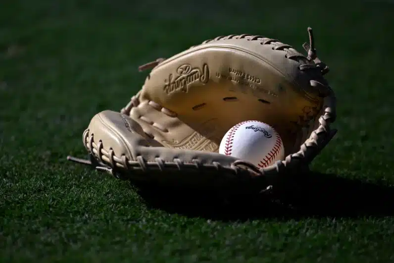  A detailed view of a Rawlings glove and baseball before the game between the Los Angeles Angels and the Colorado Rockies at Angel Stadium of Anaheim.