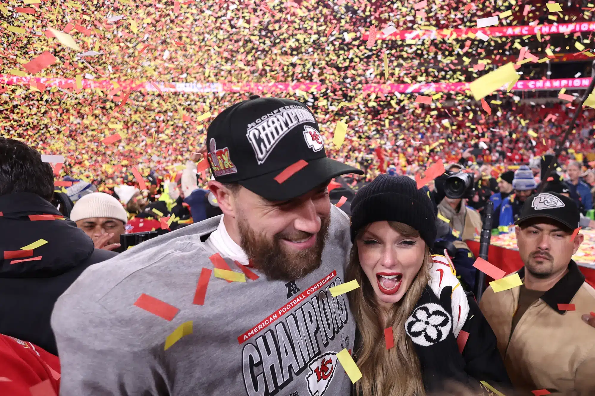 Taylor Swift celebrates with Travis Kelce #87 of the Kansas City Chiefs after defeating the Buffalo Bills 32-29 in the AFC Championship Game at GEHA Field at Arrowhead Stadium on January 26, 2025 in Kansas City, Missouri. 