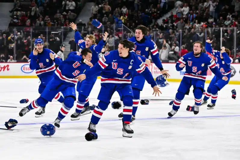 Team USA celebrates an overtime victory against Team Finland to win gold during the 2025 IIHF World Junior Championship at Canadian Tire Centre on January 5, 2025 in Ottawa, Ontario, Canada. 