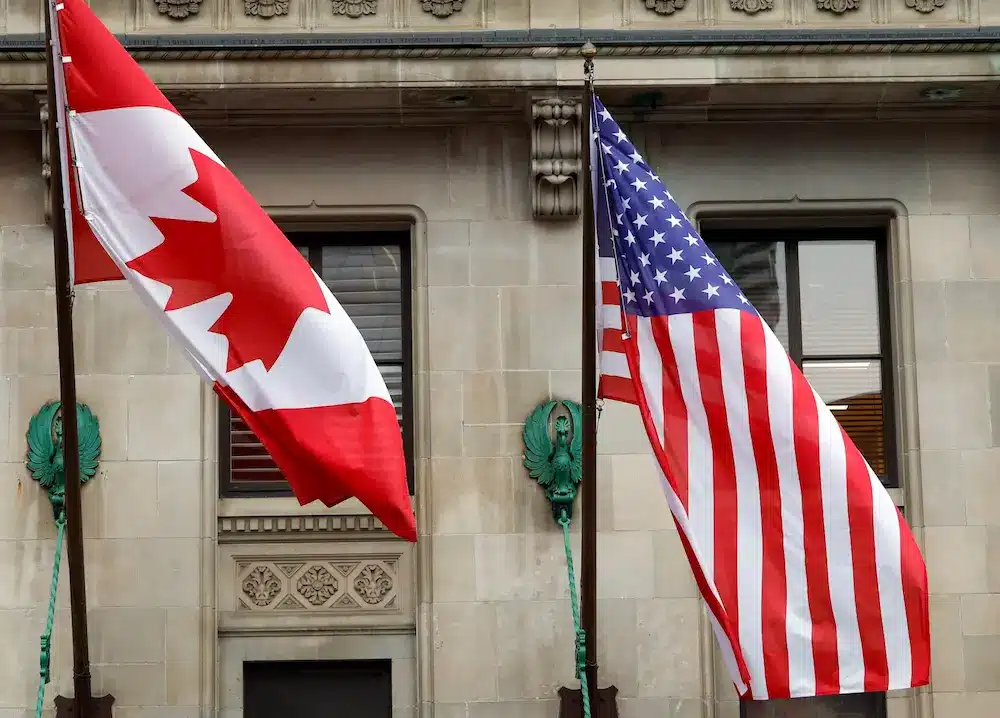 The Canadian and Unites States flags outside the Fairmont Royal York in downtown Toronto, February 3, 2025.