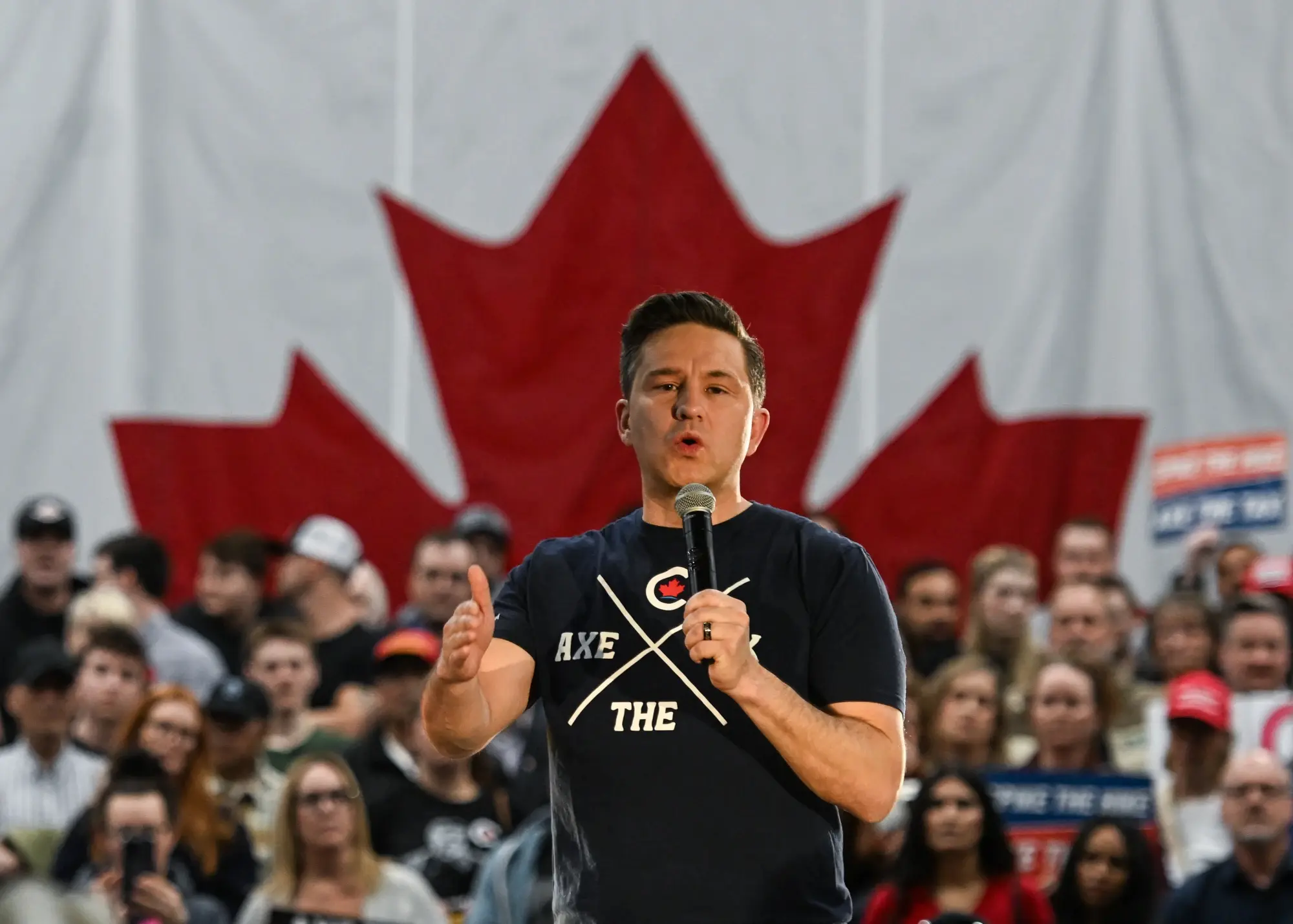 Leader of Canada's Conservative Party, Pierre Poilievre, speaks during a 'Spike the Hike - Axe the Tax' rally in Edmonton, on March 27, 2024, in Edmonton, Alberta, Canada. On April 1st, fuel prices will rise due to the Federal Carbon Tax increase.