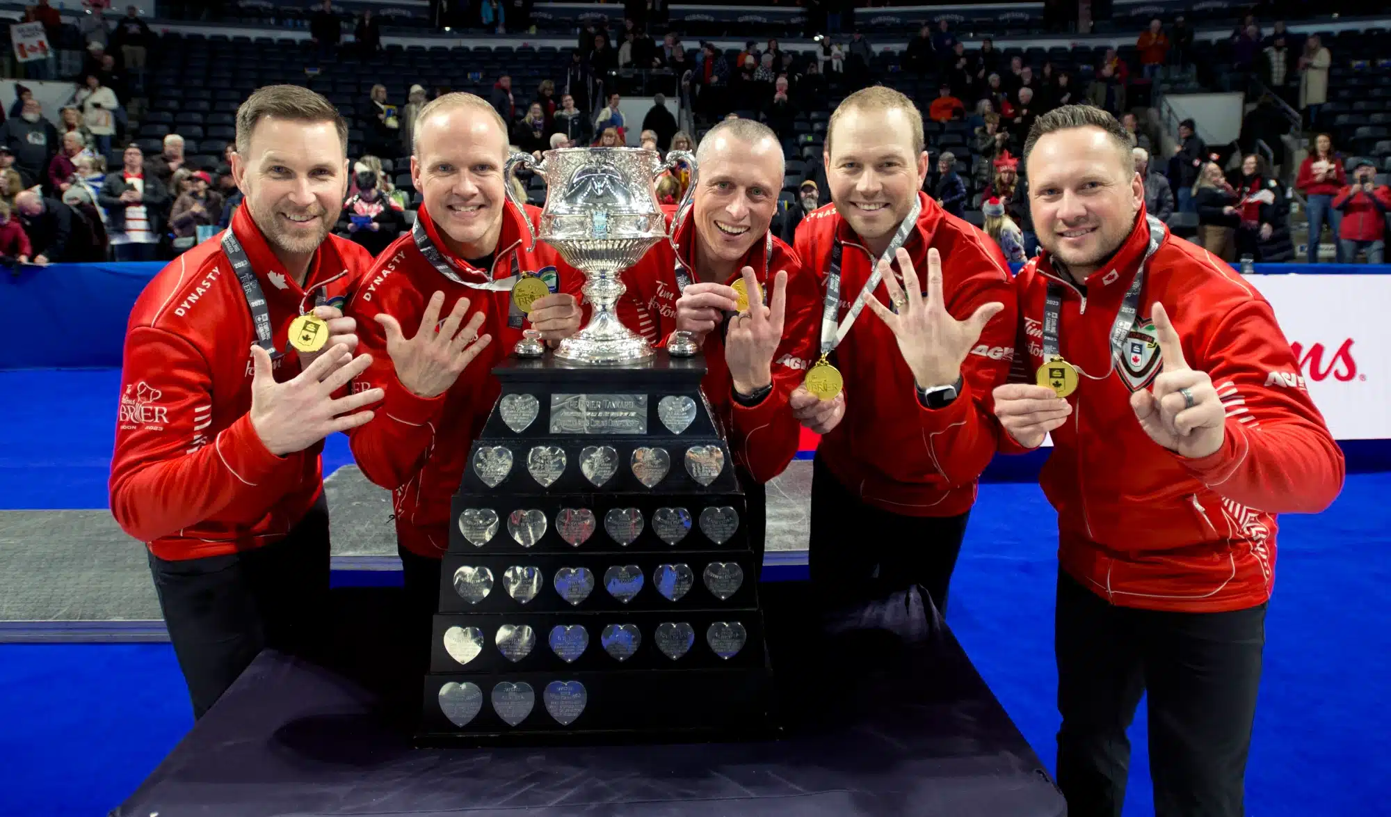 Past Brier champions Team Canada Brad Gushue, Mark Nichols, EJ Harnden, Geoff Walker, Coach Caleb Flaxey.