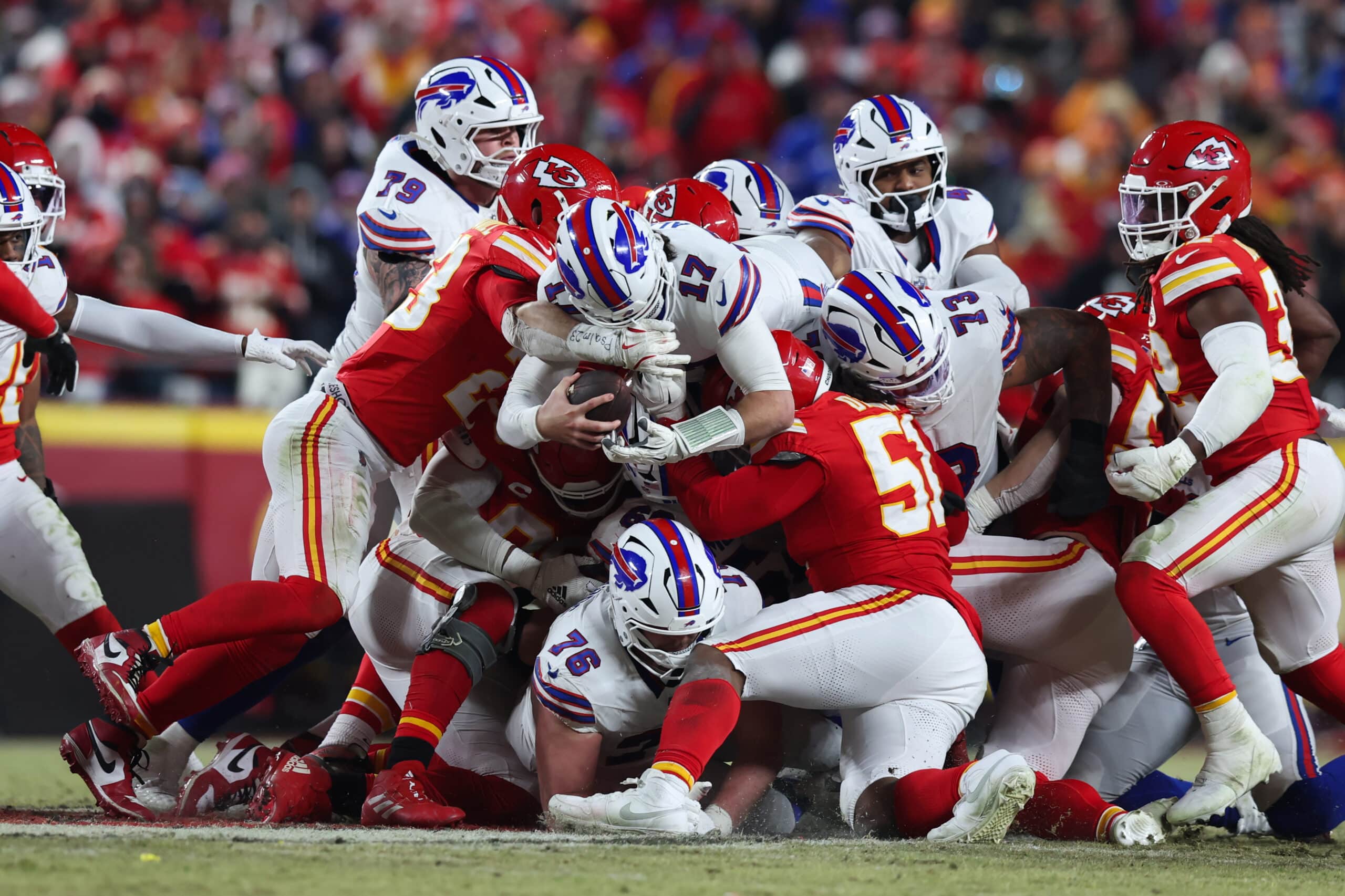 KANSAS CITY, MO - JANUARY 26: Buffalo Bills quarterback Josh Allen (17) goes over the pile to convert a fourth down early in the fourth quarter of the AFC Championship game between the Buffalo Bills and Kansas City Chiefs on January 26, 2025 at GEHA Field at Arrowhead Stadium in Kansas City, MO. (Photo by Scott Winters/Icon Sportswire via Getty Images)