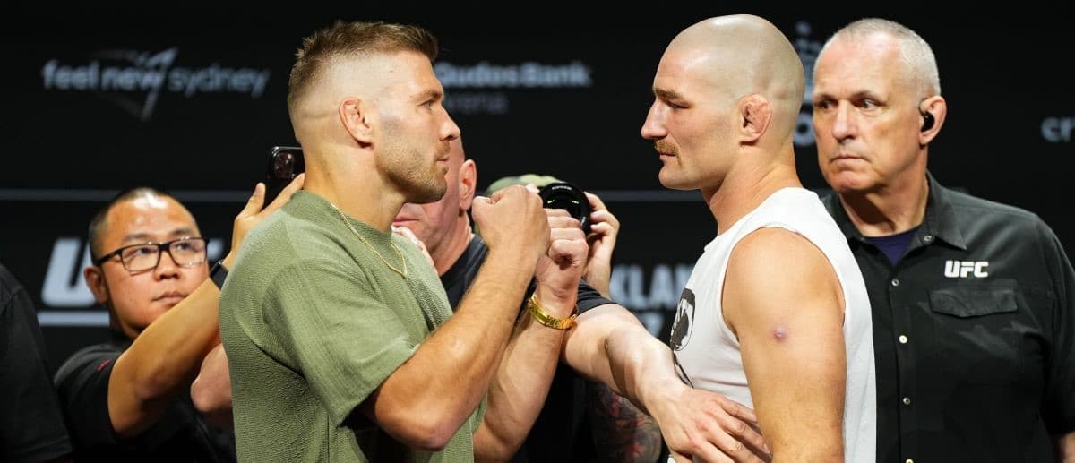 Opponents Dricus Du Plessis of South Africa and Sean Strickland face off during the UFC 312 press conference at Qudos Bank Arena on February 06, 2025 in Sydney, Australia.